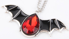 Bat necklace with red crystal on chain 