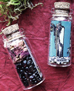 The Pretty Cult tarot in a bottle spell Carry your favorite card with you, made with love with cleansed crystals and herbs