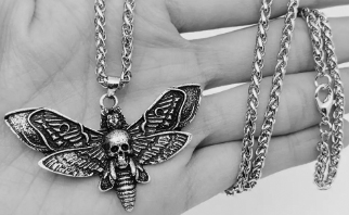 Antique skull moth pendant necklace