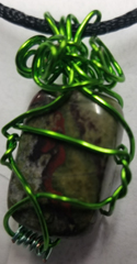 Dragons Blood jasper tumbled wire wrapped pendant necklace on black cord